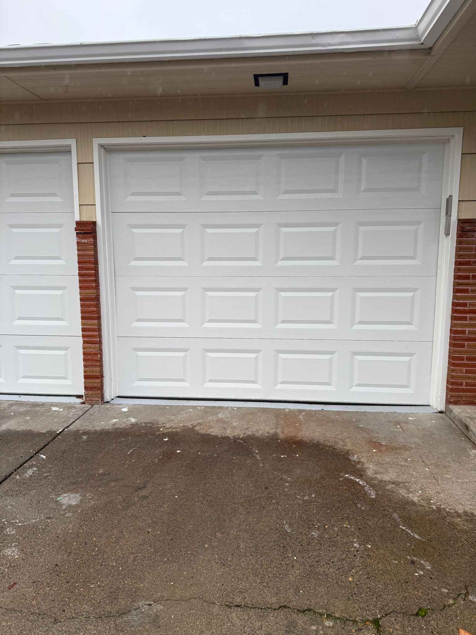 PDX Garage Door technician conducting free on-site commercial door assessment