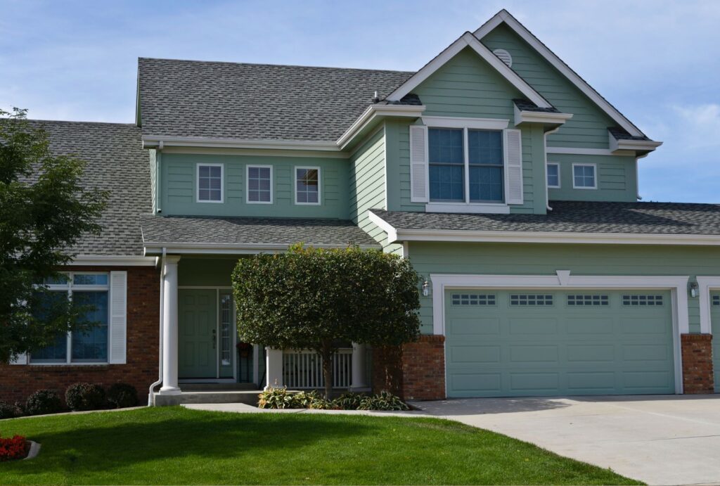 Garage Door Panel Replacement Cost In Portland: What You’ll Really Pay in 2026